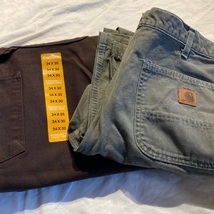 TWO PAIRS of Carhartt Dungaree fit work pants.